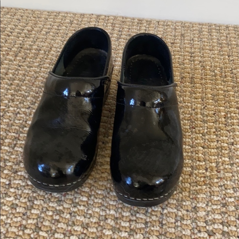 black patent clogs